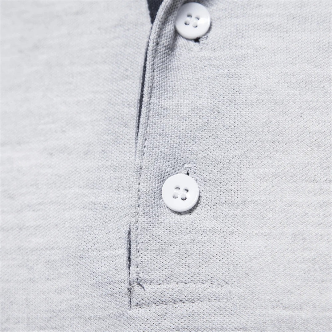 Polo in cotone ricamata a maniche lunghe da uomo