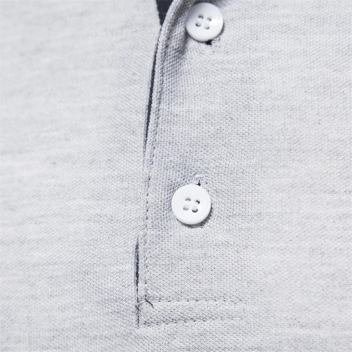 Polo in cotone ricamata a maniche lunghe da uomo