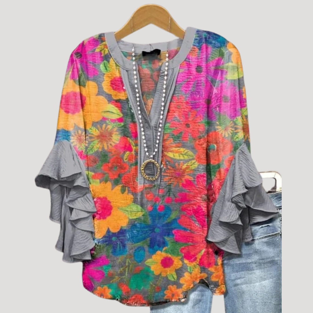 Blusa floreale a maniche a volant con scollo a V per donne