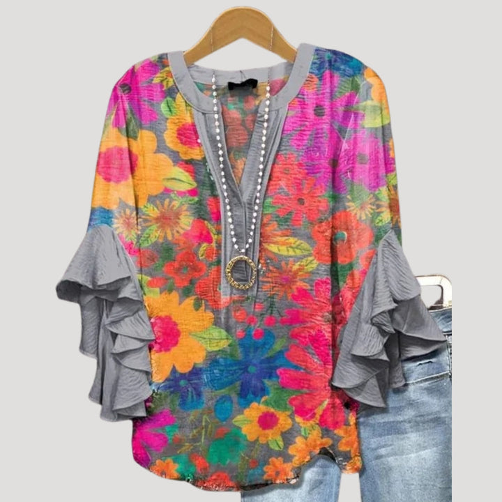 Blusa floreale a maniche a volant con scollo a V per donne